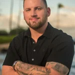 A headshot of Devin Hammack